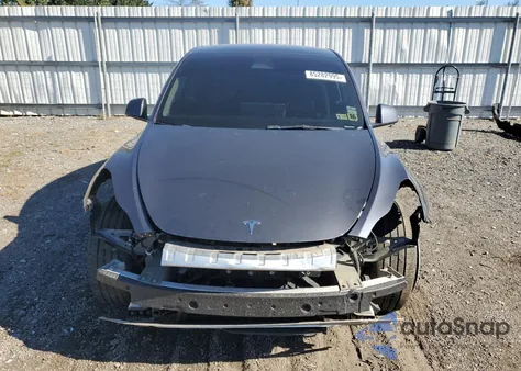 2023 Tesla Model Y z USA, uszkodzony, nr VIN 7SAYGAEE0PF706991